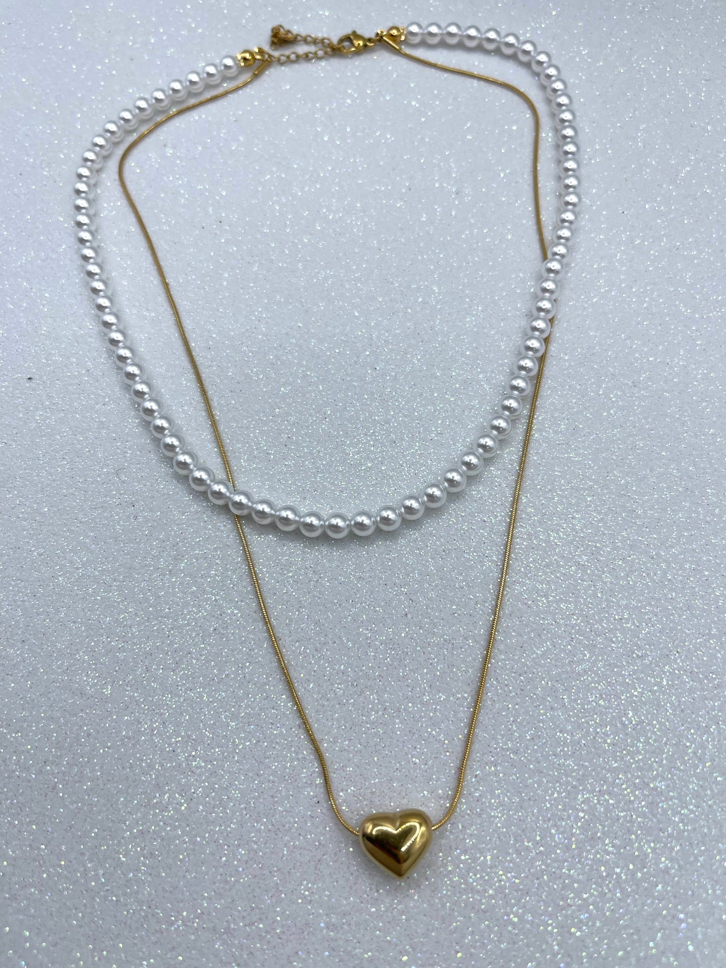 Doppia collana con perle e filo cuore gold